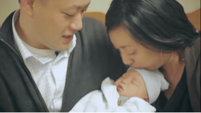 They Waited Nine Years to Meet This Baby—In Their First Few Moments Together, Something Glorious Happens
