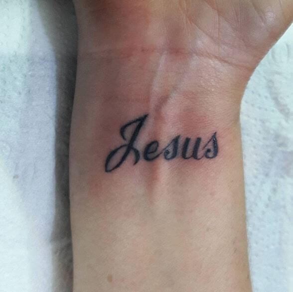 Jesus name is cursive christian tattoo design